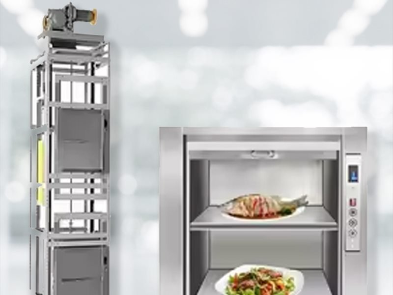 Table-height dumbwaiter landing door open at counter level