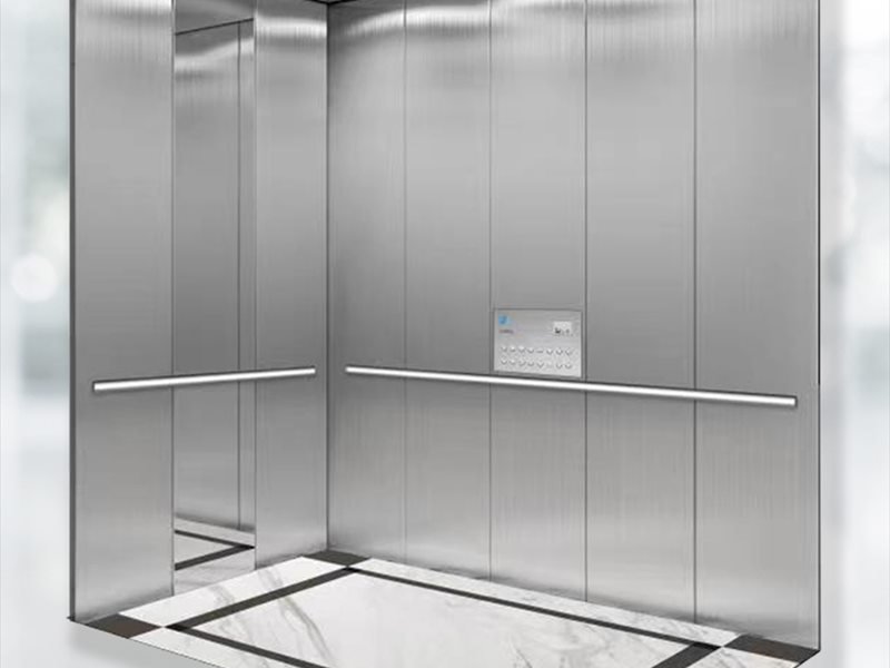 Hospital elevator landing doors on a clinical corridor